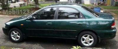 FORD LASER LYNX 1999 1.6i DOHC, KM 115RB ASLI, ORI