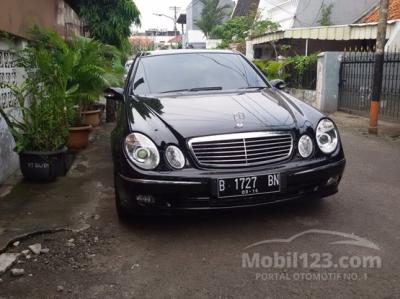 Mercedes Benz E240 w211 Hitam 2005 Built Up Triptonic Panoramic